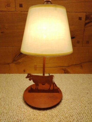 Lampe vache patine rouille